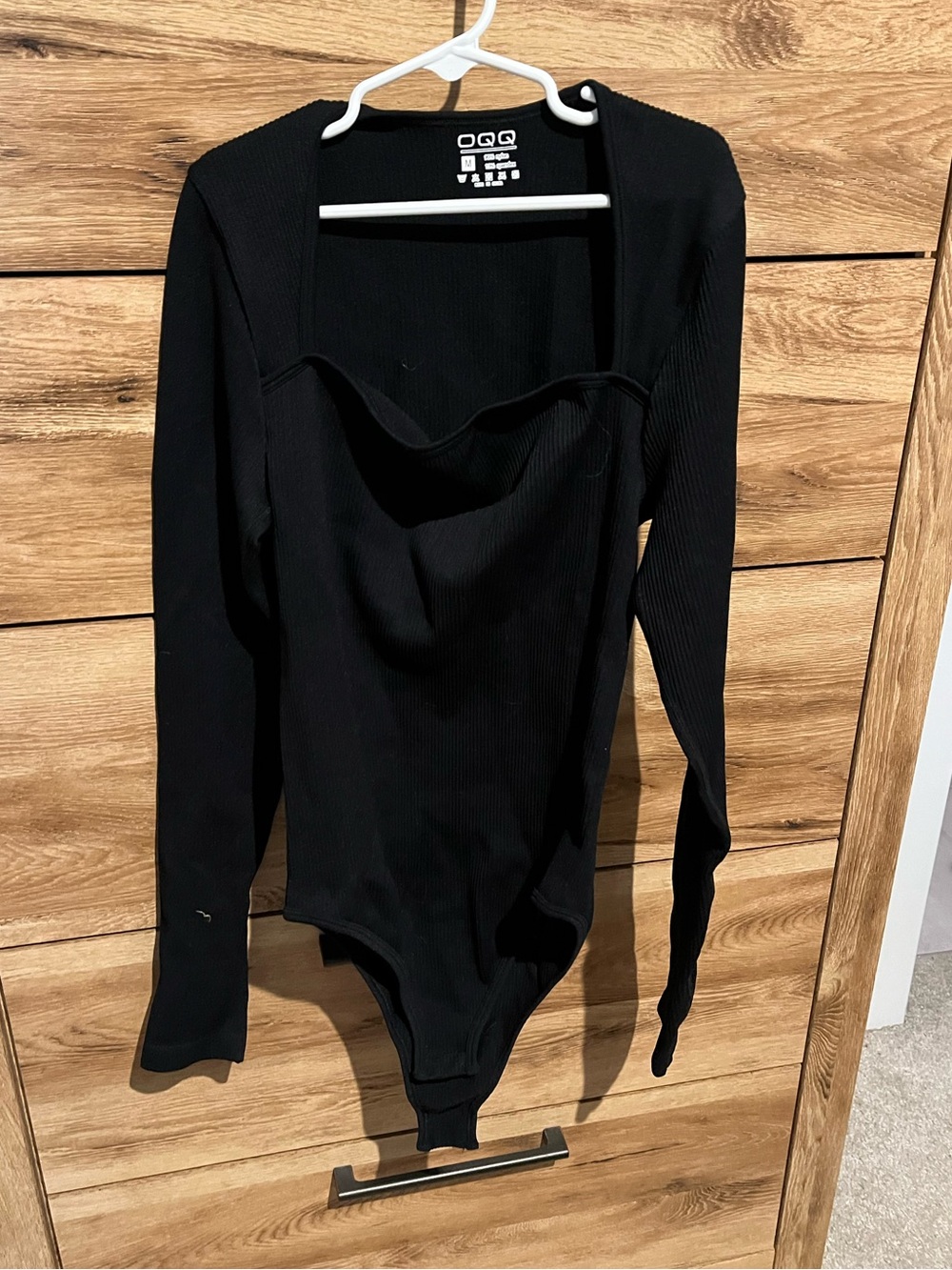 OQQ Black Ribbed Long-Sleeve Bodysuit